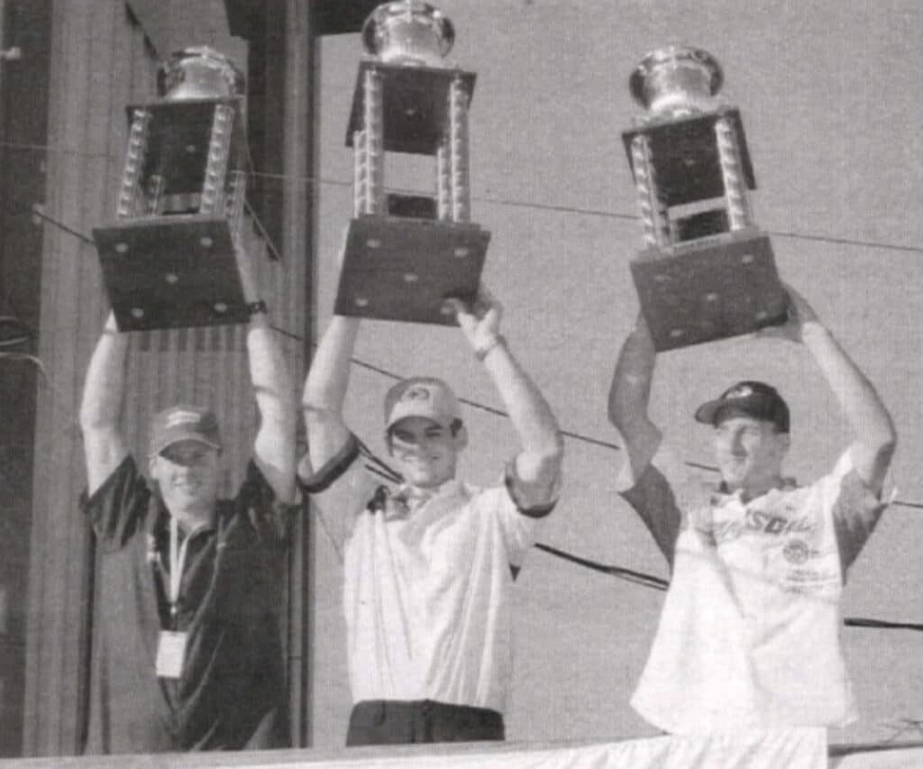 Mike LaRocco (right) on the Steel City 2001 podium, the first of a streak of 36 250/450 podiums for Honda. Cycle News Archives